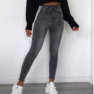 Solid paperbag slinky denim jeans